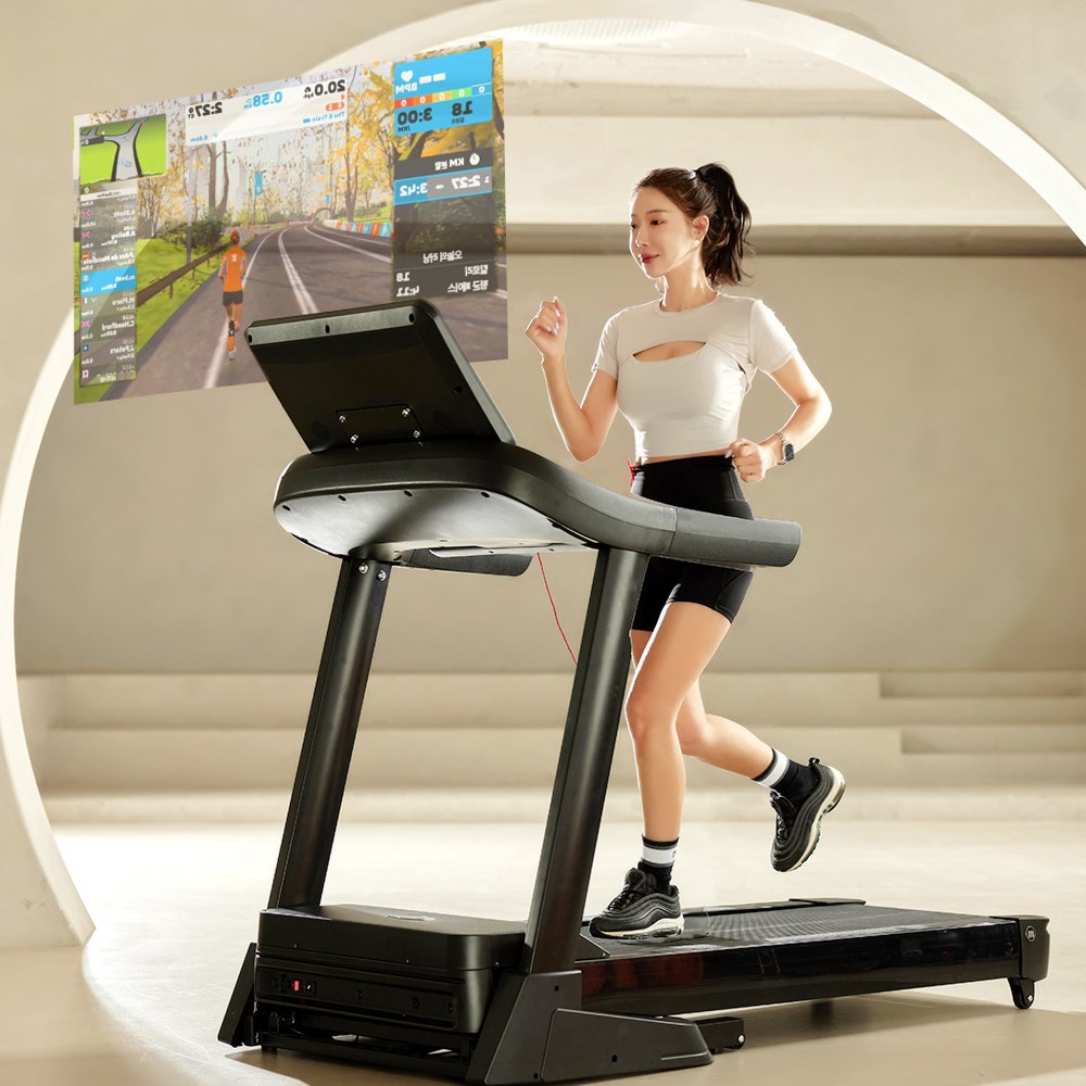 Runner on Melkin RX8 treadmill with a virtual running course on screen