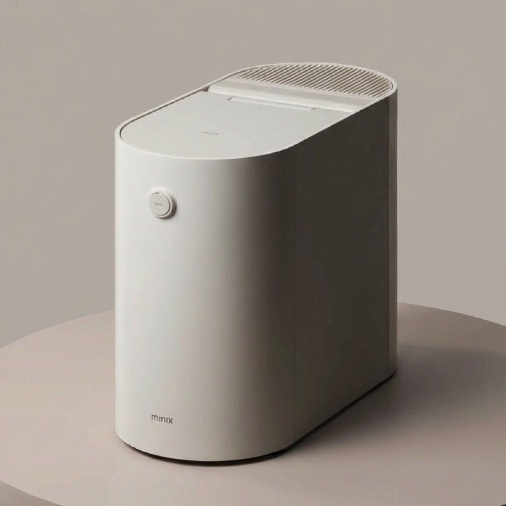 Minix The Plender PRO food waste disposer in beige on a round table